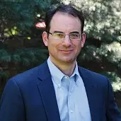 AG Weiser in front of a tree.